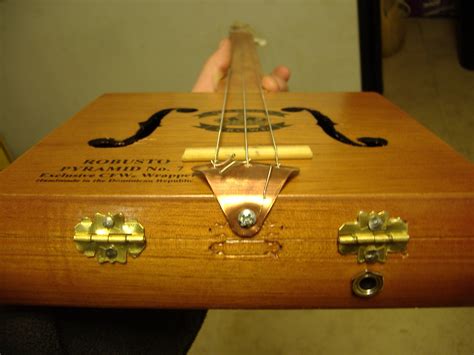 how to build an electric cigar box guitar|homemade cigar box guitar.